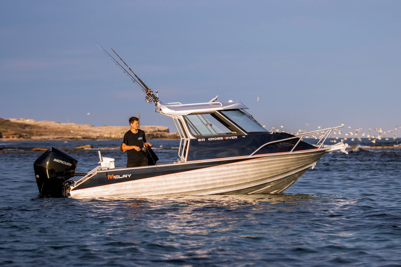 Mclay 611 CrossXover Hardtop with an attractive curved glass screen and glass sliding side windows.